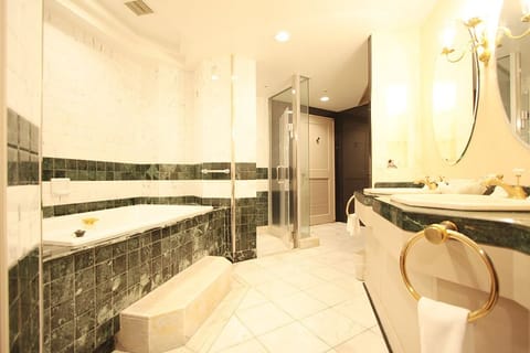 Corner Suite Room | Bathroom | Combined shower/tub, hair dryer, slippers, bidet