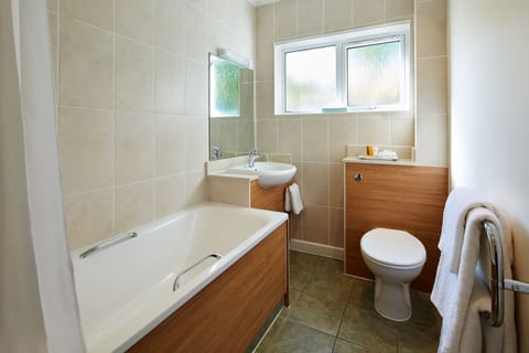 Premium Double Room, 1 King Bed | Bathroom | Combined shower/tub, eco-friendly toiletries, hair dryer, towels