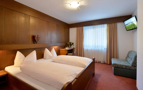 Desk, laptop workspace, free WiFi, bed sheets