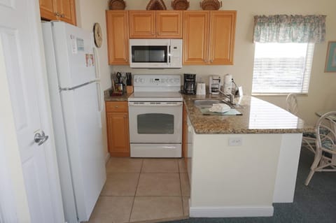 Condo, 1 Bedroom, Balcony (Sofabed) | Private kitchen | Fridge, microwave, stovetop, dishwasher