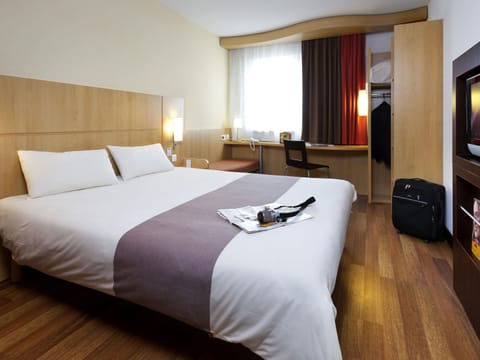 Room | Desk, blackout drapes, soundproofing, iron/ironing board