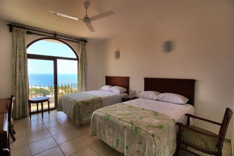 Standard Room, 2 Double Beds, Ocean View | Beach/ocean view