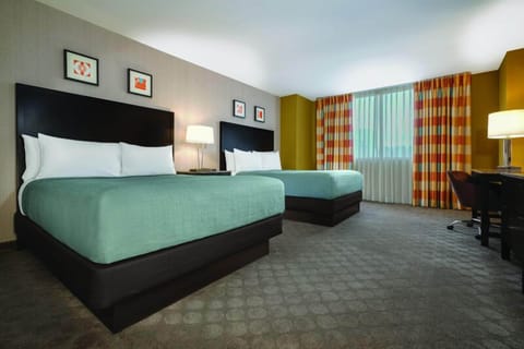 West Tower Double Queen Room | In-room safe, blackout drapes, free WiFi, bed sheets