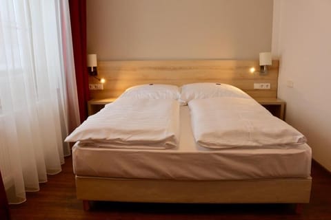 Desk, blackout drapes, free WiFi, bed sheets