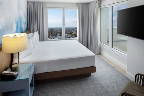 Junior Suite City View | Premium bedding, in-room safe, blackout drapes, iron/ironing board