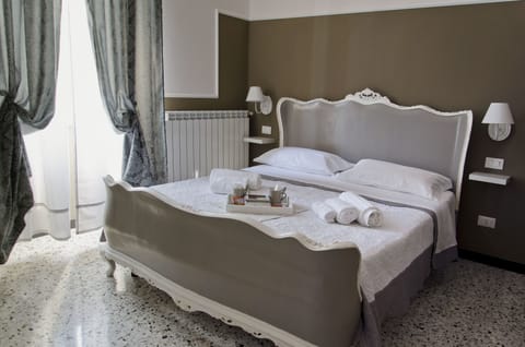 Deluxe Double Room | Memory foam beds, desk, soundproofing, free cribs/infant beds