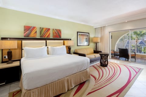 Junior Suite Pool View, Junior Suite | Minibar, in-room safe, blackout drapes, iron/ironing board