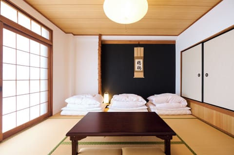 Japanese Style Triple Room with Shared Bathroom | Down comforters, free WiFi, bed sheets