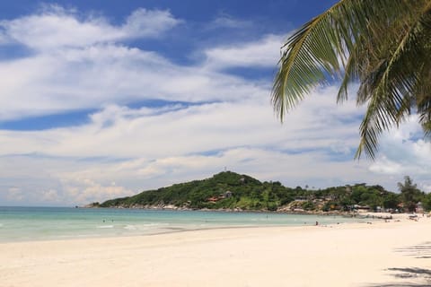 On the beach, white sand, beach towels