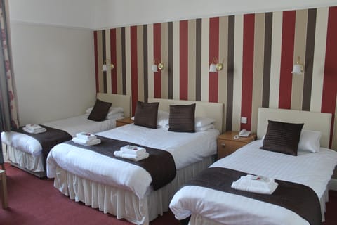 Family Room, Multiple Beds | Iron/ironing board, free WiFi, bed sheets