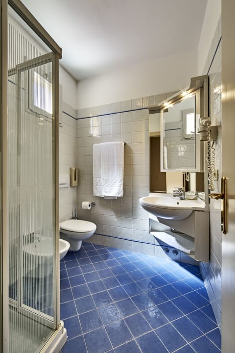 Family Room, Balcony | Bathroom | Hair dryer, bidet, towels