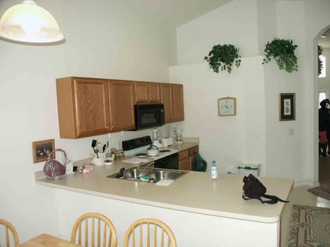 Villa | Private kitchen | Full-size fridge, microwave, oven, stovetop