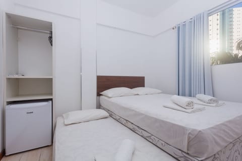 Standard Triple Room | Minibar, blackout drapes, free WiFi, bed sheets