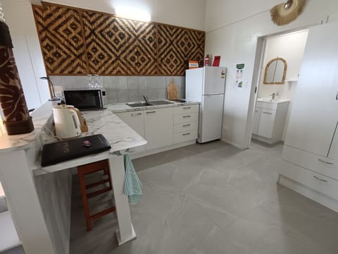 Muri Retreat - Private Studio Lagoon Views | Kukupa | Private kitchen | Full-size fridge, microwave, stovetop, coffee/tea maker