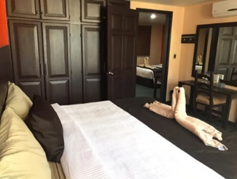 Suite, Multiple Beds | Desk, free WiFi, bed sheets