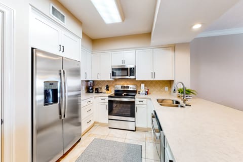 Condo, 4 Bedrooms | Private kitchen | Coffee/tea maker, cookware/dishes/utensils, dining tables