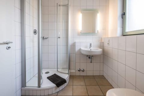 Standard Double Room | Bathroom | Shower, free toiletries, hair dryer, bathrobes