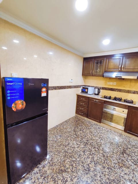 Royal Apartment | Private kitchen | Fridge, microwave, coffee/tea maker, electric kettle