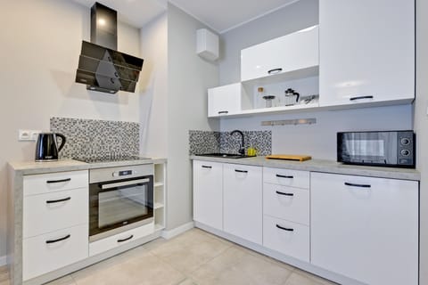 Comfort Apartment, 1 Bedroom, Balcony (with parking -53) | Private kitchenette | Fridge, oven, stovetop, dishwasher