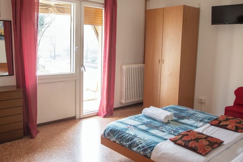 Standard Triple Room, Multiple Beds, Shared Bathroom, Park View | Down comforters, minibar, desk, laptop workspace