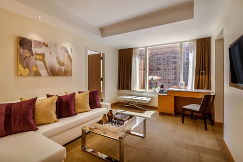 Deluxe Suite, 1 Bedroom | Living room | Flat-screen TV