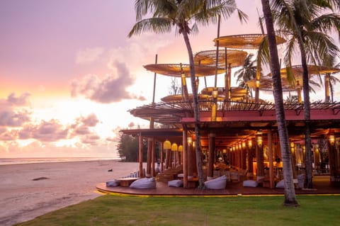 On the beach, sun loungers, beach umbrellas, beach towels