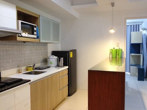 Family Suite | Private kitchen | Full-size fridge, microwave, stovetop, electric kettle