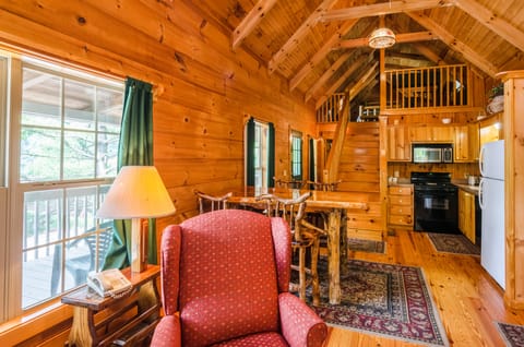 Three Bedroom Cabin The Cherokee or The Stuart | Living area | Flat-screen TV