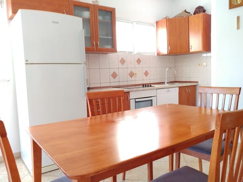 Apartment, 2 Bedrooms, Sea View (A6) | Private kitchen | Fridge, stovetop, coffee/tea maker, electric kettle