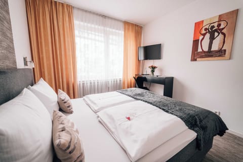 Economy Double Room | Desk, iron/ironing board, free WiFi, bed sheets