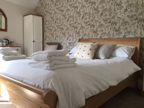 Signature Double Room | Blackout drapes, iron/ironing board, free WiFi, bed sheets