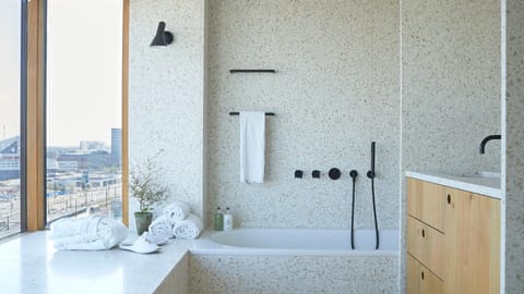 Designer toiletries, hair dryer, bathrobes, towels