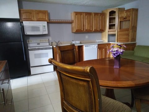 Suite, 1 King Bed with Sofa bed, Non Smoking | Private kitchen | Mini-fridge, microwave