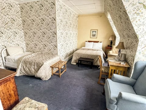 Deluxe Room, 2 Double Beds | Individually decorated, individually furnished, iron/ironing board