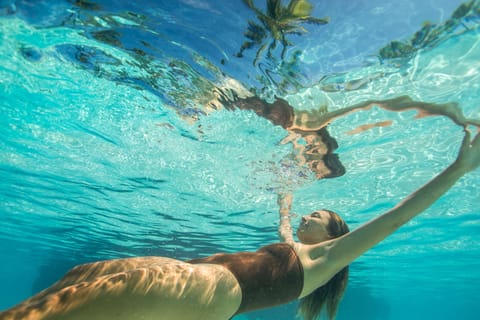 Outdoor pool, cabanas (surcharge), pool umbrellas