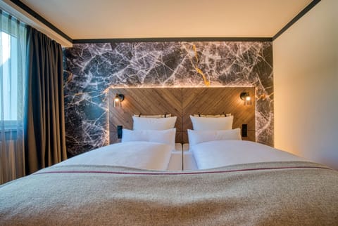 Hypo-allergenic bedding, in-room safe, desk, soundproofing