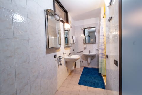 Economy Triple Room, Shared Bathroom, Annex Building | Bathroom | Hair dryer, towels