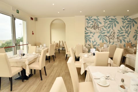 Breakfast, lunch, dinner served; beach views