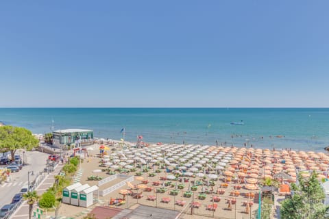 On the beach, sun loungers, beach towels, beach yoga