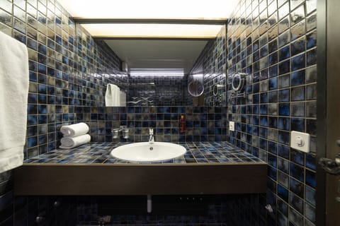 Double Room (Churfirsten) | Bathroom | Combined shower/tub, deep soaking tub, hair dryer, towels