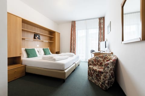 Economy Double or Twin Room, Balcony | In-room safe, desk, laptop workspace, free WiFi