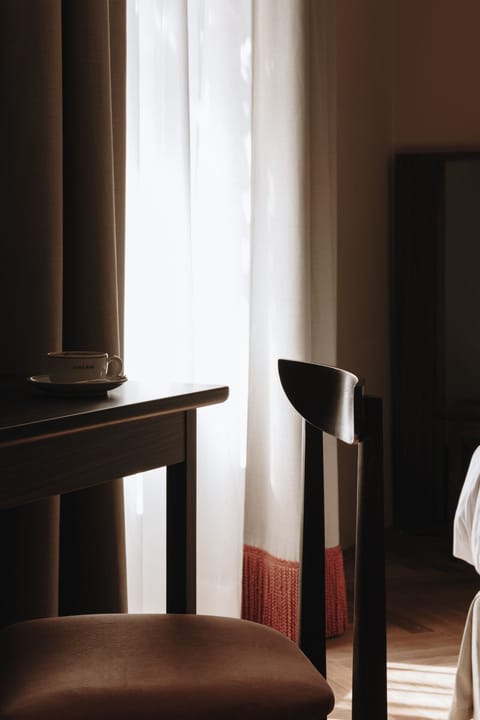 Premium bedding, down comforters, minibar, in-room safe