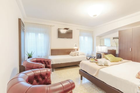 Triple Room | Select Comfort beds, minibar, in-room safe, desk