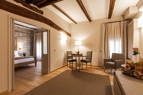 Suite | Premium bedding, down comforters, memory foam beds, minibar