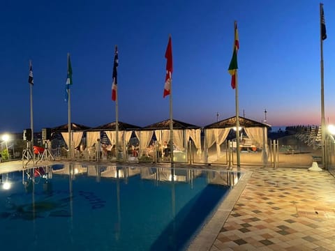 Private beach nearby, black sand, beach bar