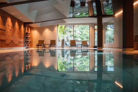 Indoor pool, outdoor pool, pool umbrellas, sun loungers