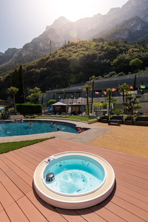 Seasonal outdoor pool, open 9:00 AM to 6:00 PM, pool umbrellas