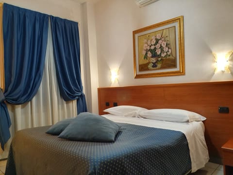 Double or Twin Room | Minibar, in-room safe, desk, free WiFi