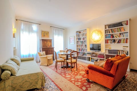 Deluxe Double Room | Living area | TV