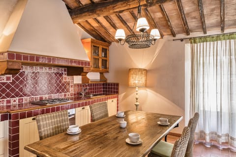 Apartment, 2 Bedrooms (first floor) | Private kitchen | Stovetop, highchair, cookware/dishes/utensils